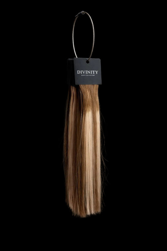 Divinity Hair Co. Color Ring shade guide with all 21 human hair extension swatches on a black background